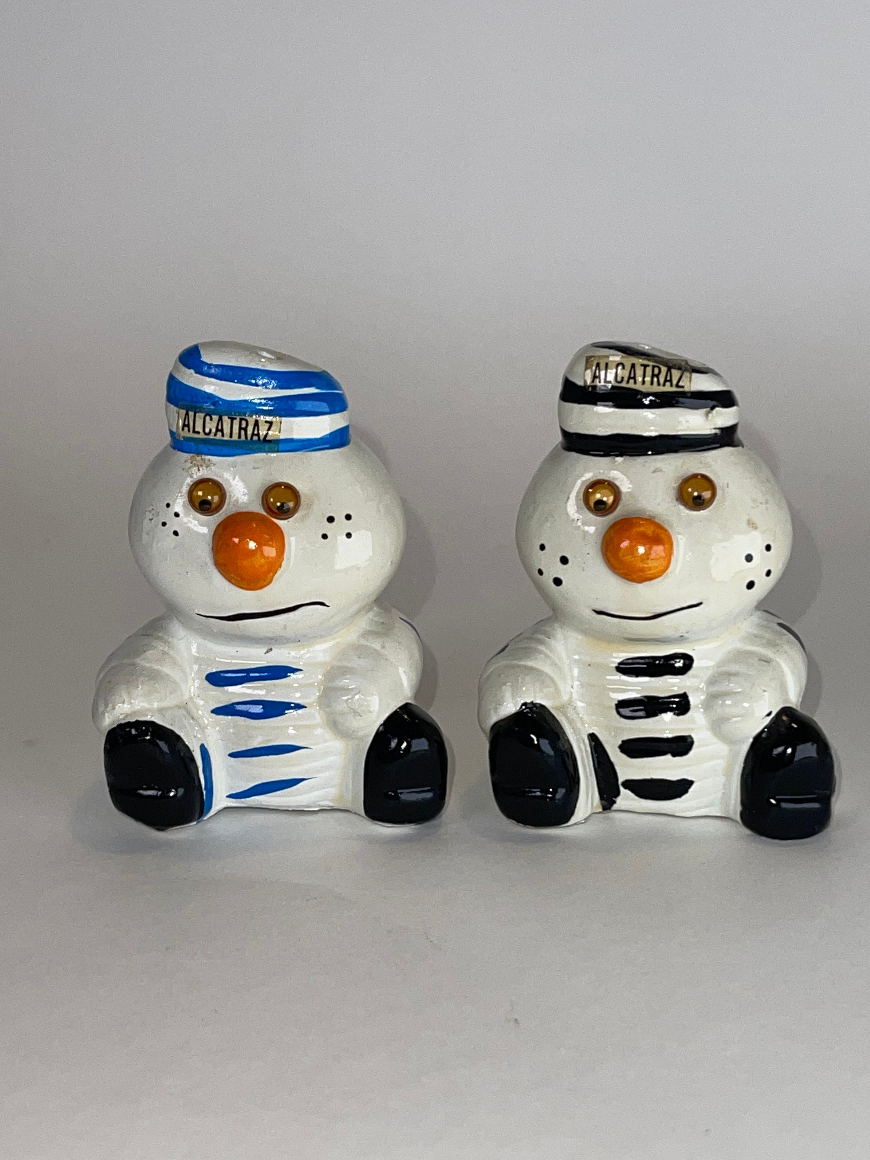 Alcatraz Prisoner Snowman Duo (with Table + Shelf‑Wear Swagger)