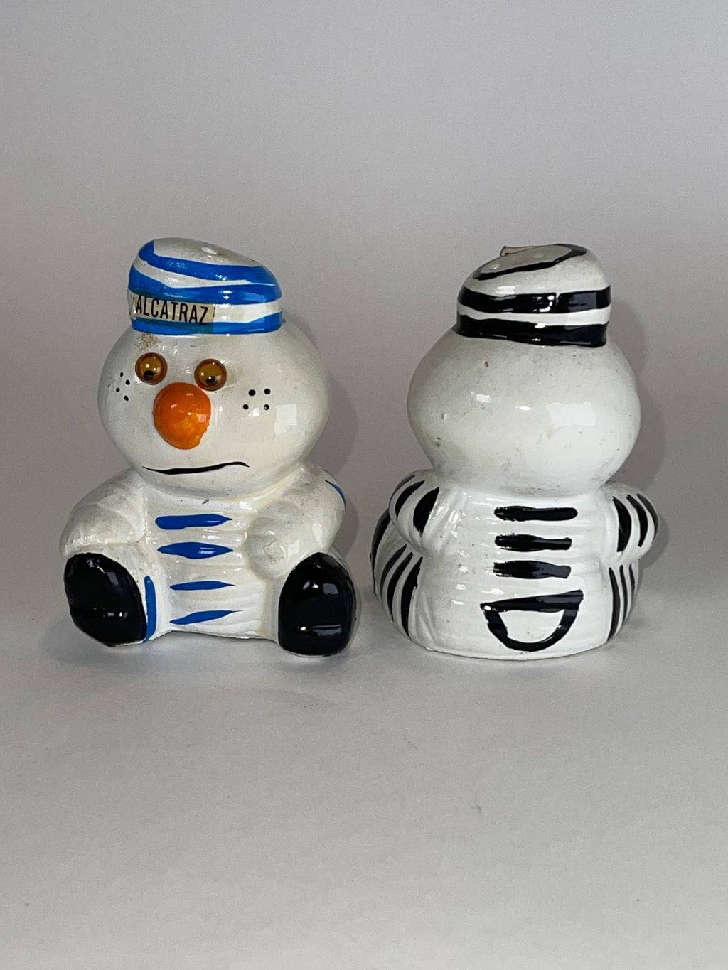 Alcatraz Prisoner Snowman Duo (with Table + Shelf‑Wear Swagger)