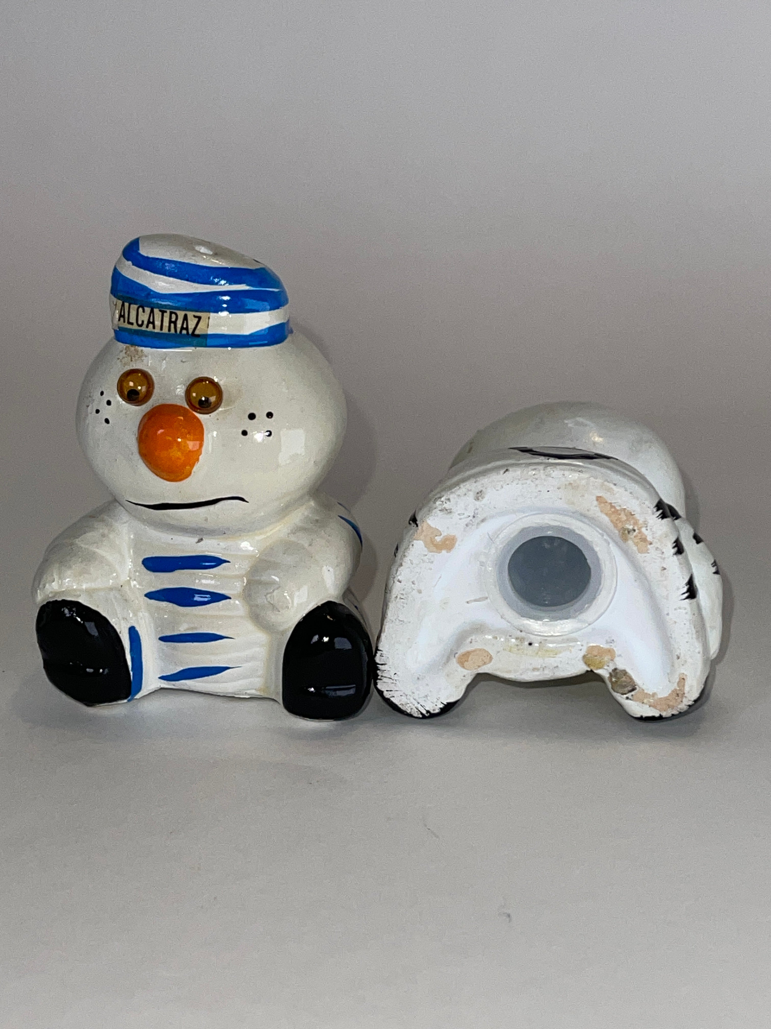 Alcatraz Prisoner Snowman Duo (with Table + Shelf‑Wear Swagger)