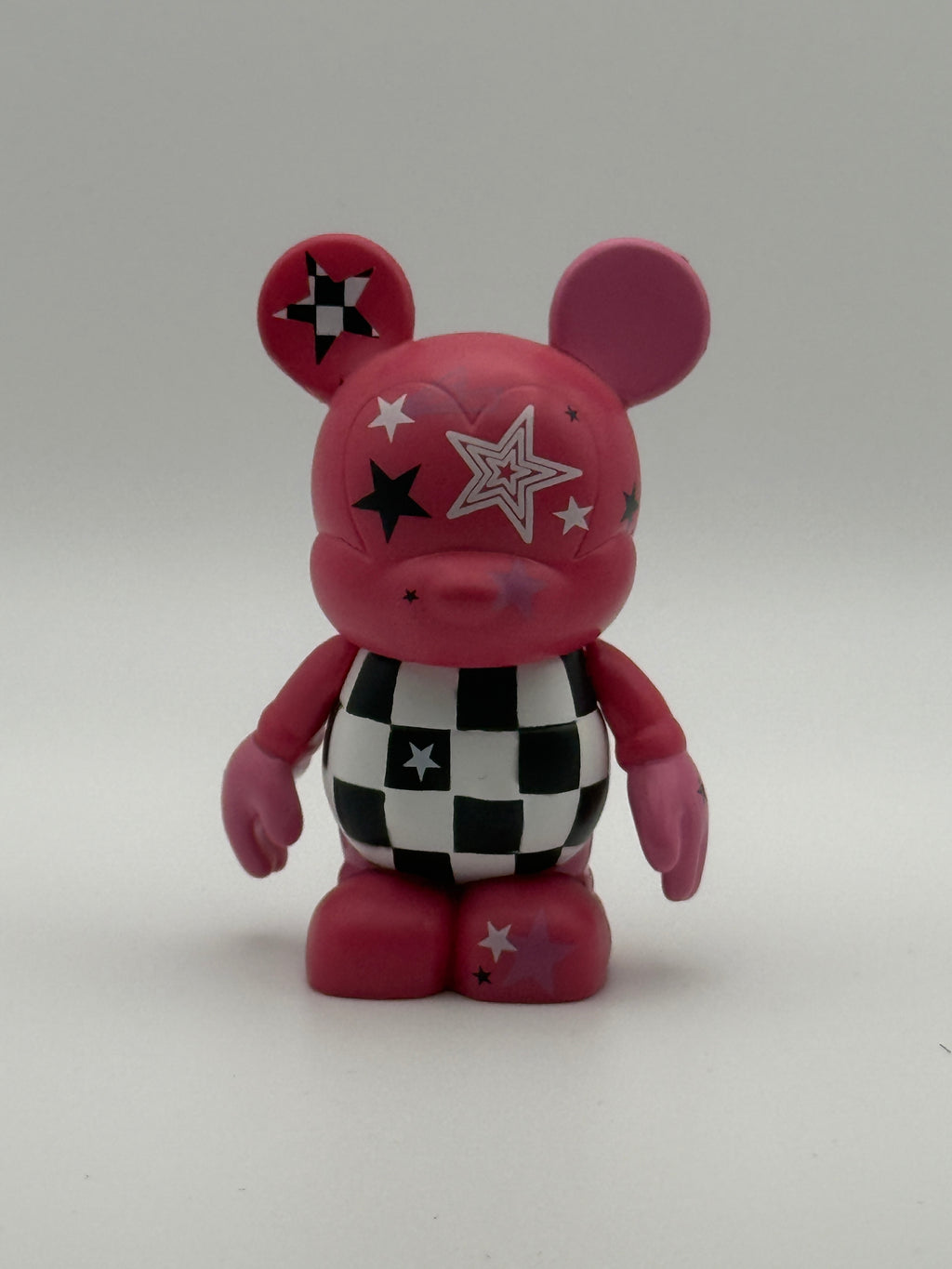 Disney Vinylmation 3" Urban Series 5 "Chasing Pink Rock Star" figure.