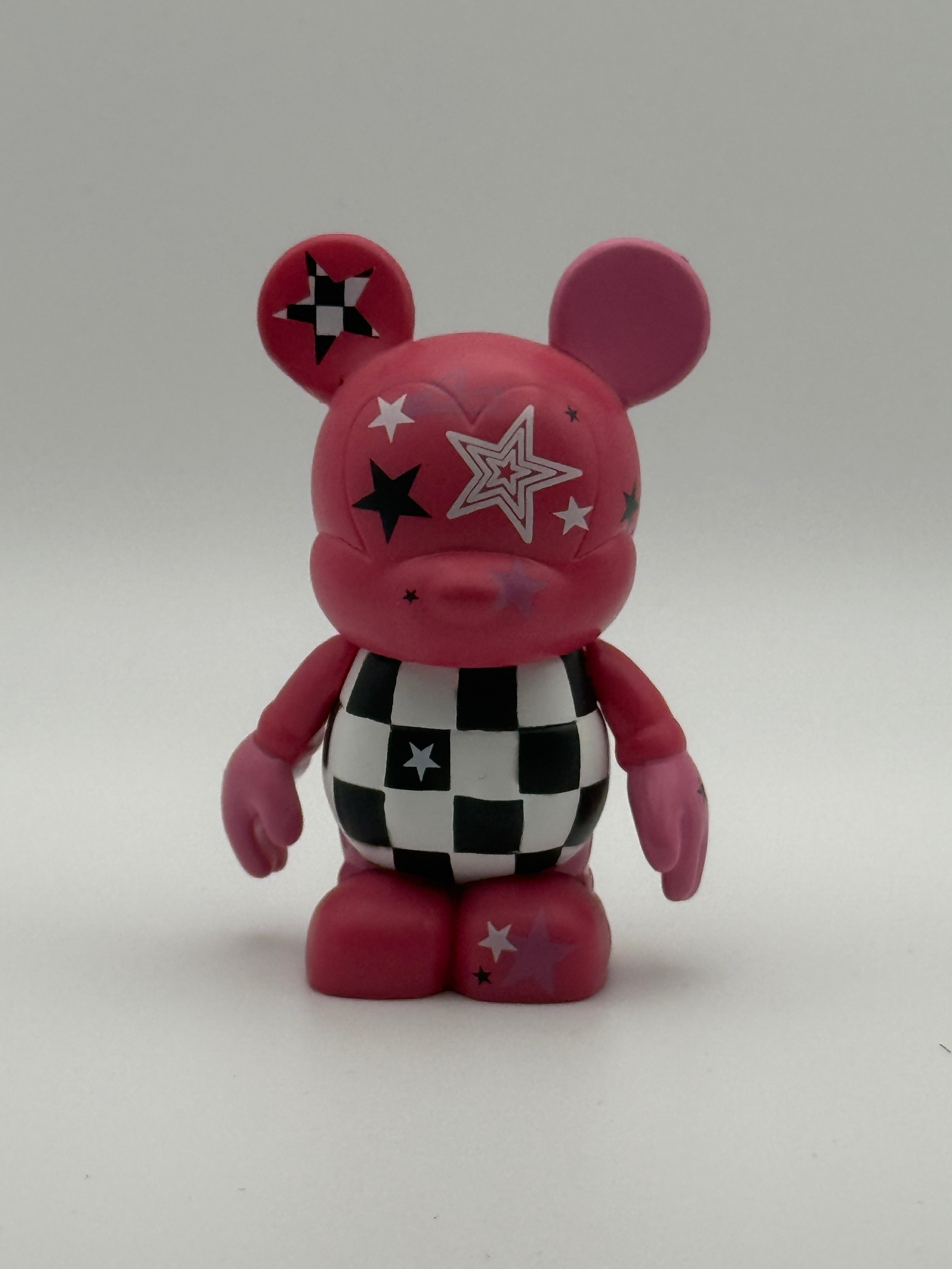 Disney Vinylmation 3" Urban Series 5 "Chasing Pink Rock Star" figure.