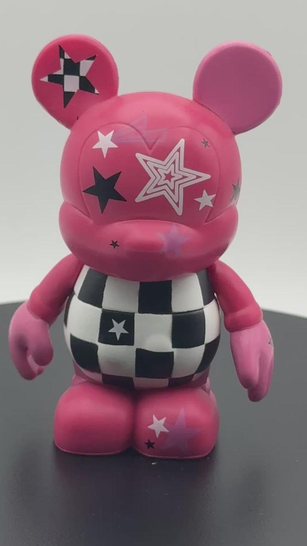 Disney Vinylmation 3" Urban Series 5 "Chasing Pink Rock Star" figure.