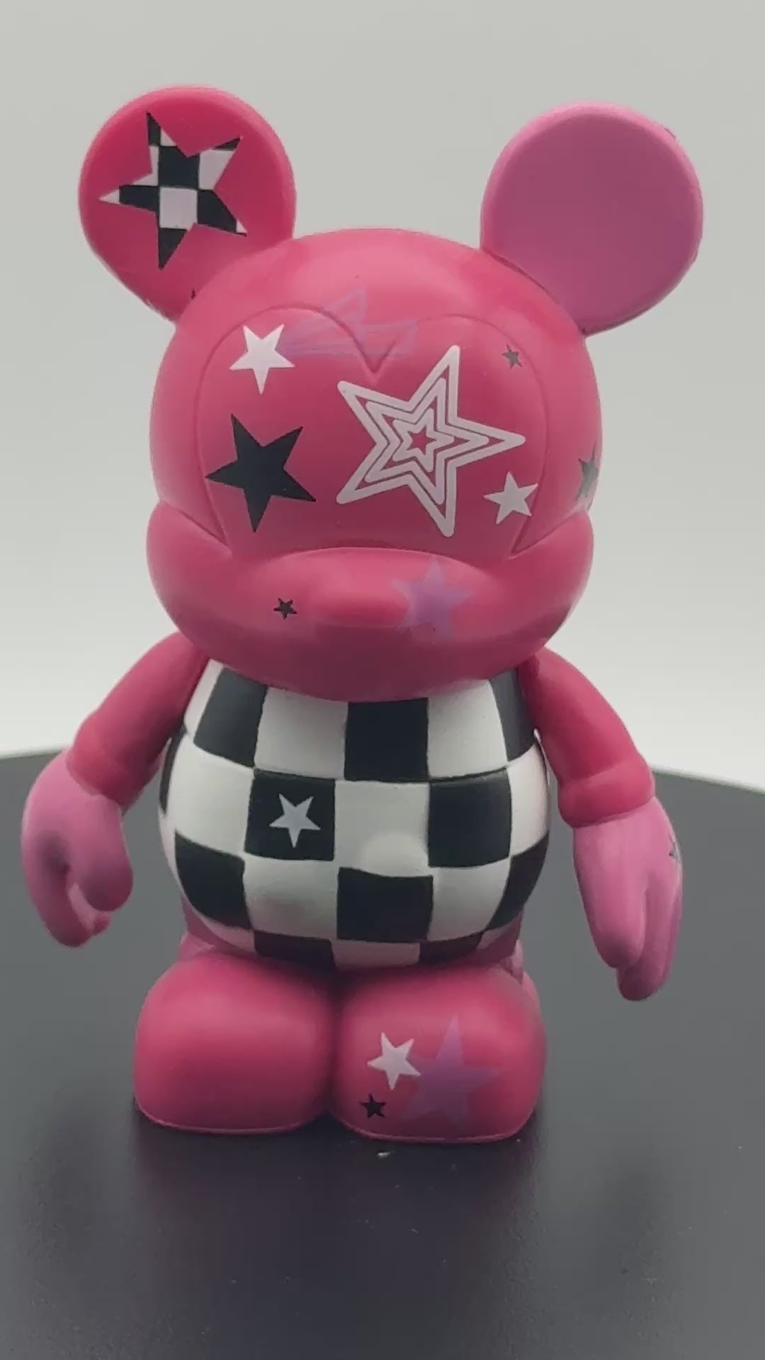 Disney Vinylmation 3" Urban Series 5 "Chasing Pink Rock Star" figure.